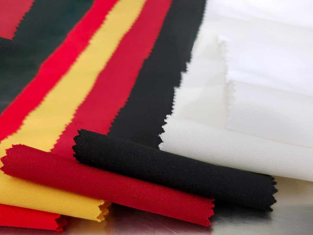 tela para cortinas amarilla, negra, blanca, crema y rojo 