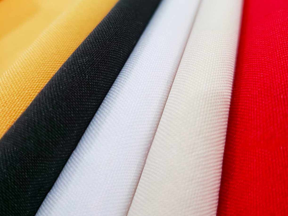 tela para cortinas amarilla, negra, blanca, crema y rojo 